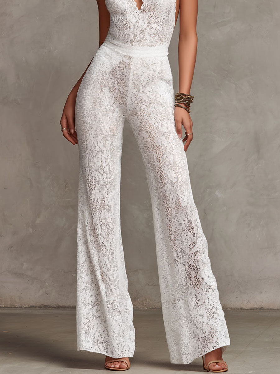 Isabella lace jumpsuit in white, detail of flared lace trouser leg