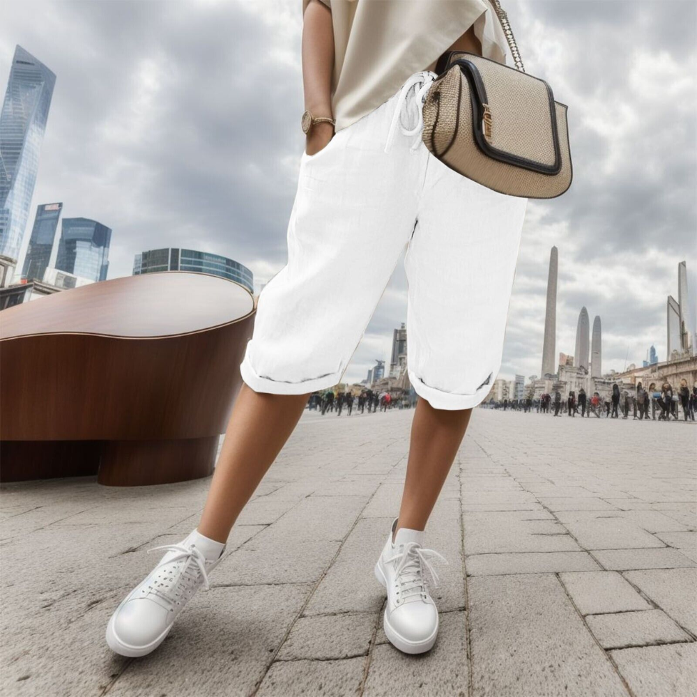 Noa cotton linen shorts in white, front view on model