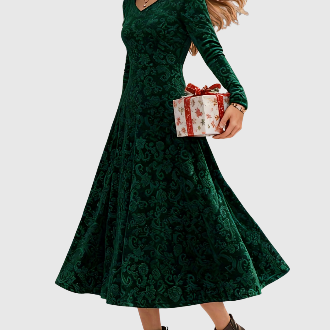 Grece velvet dress in green, close view of patterned skirt