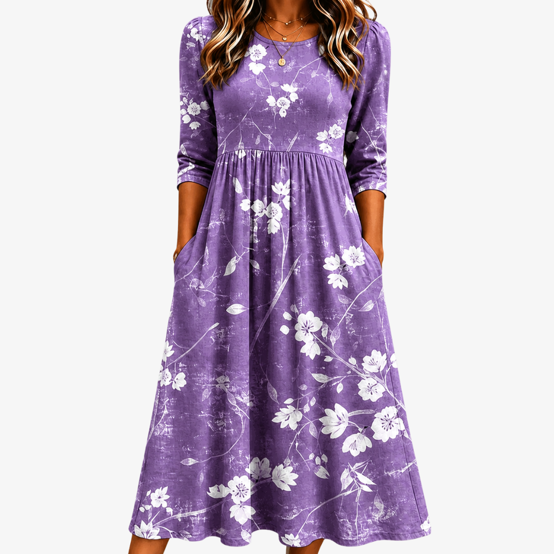 Lavender floral pocket midi dress in purple with white blossom print, front view