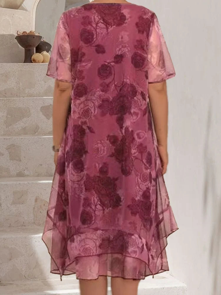Margot floral dress in burgundy, close view of layered hem