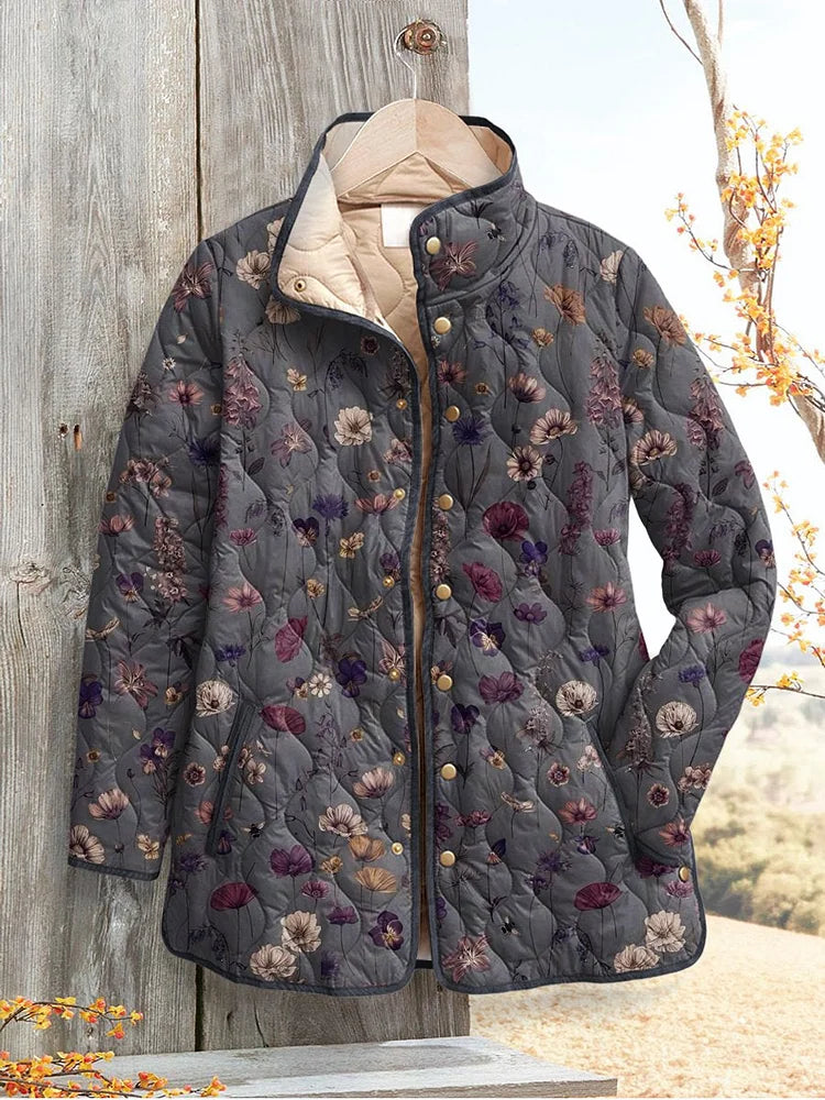 Evelyn quilted jacket in grey floral print, front view with stand collar and gold studs
