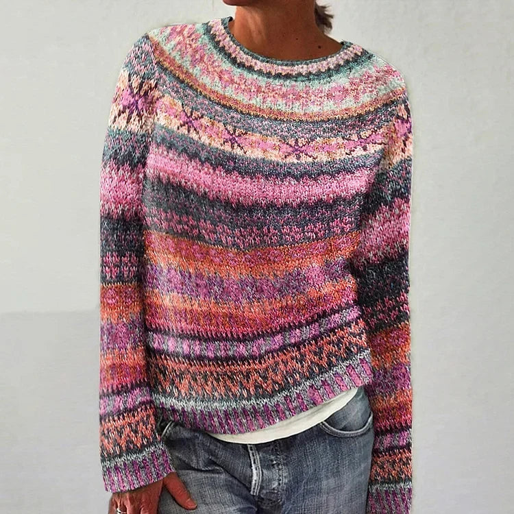 Brooke retro Scandinavian knitted sweater in pink multicolour, front view with jeans