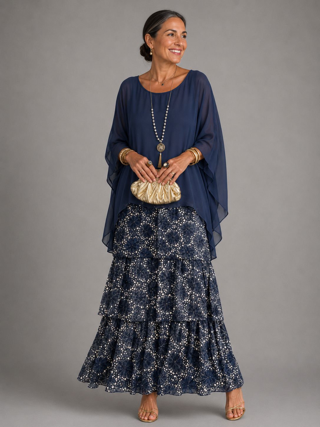 Lara tiered maxi dress in dark blue with printed tiered skirt, full-length front view