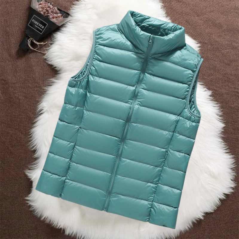 Isa padded gilet in mint green, quilted sleeveless front view with zip
