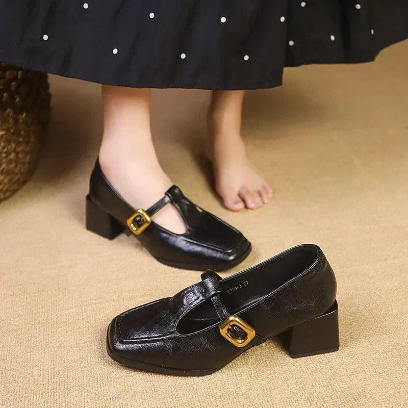 Rosa Mary Janes in black, detail of gold side buckle
