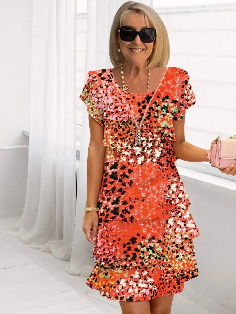 Clarissa ruffle tiered dress in orange red floral print, full front view