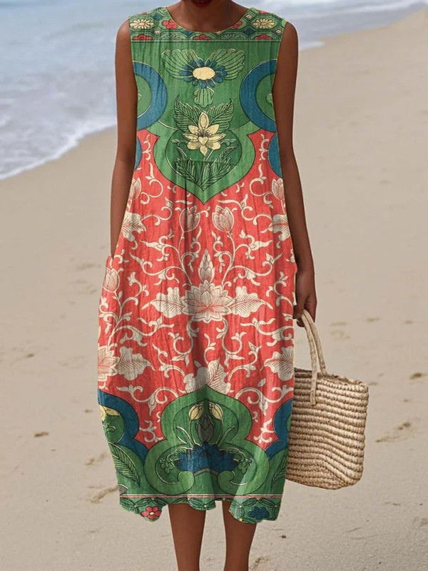 Vera bohemian midi dress in coral and green floral print, full-length front view