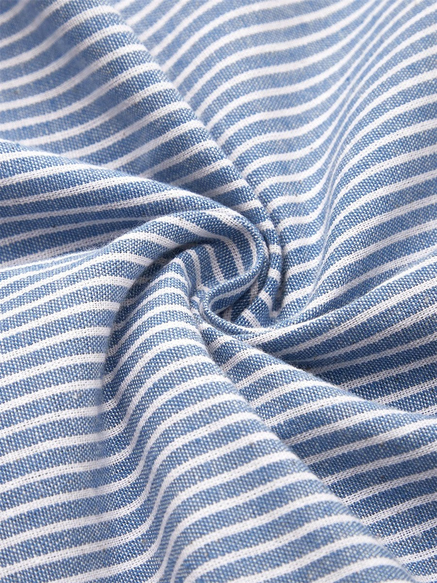 Close-up of the blue and white striped fabric of the Sofia dress