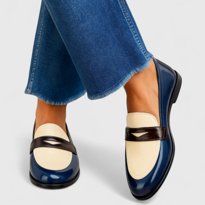 Francesca elegant loafers in navy with cream, worn with cropped jeans