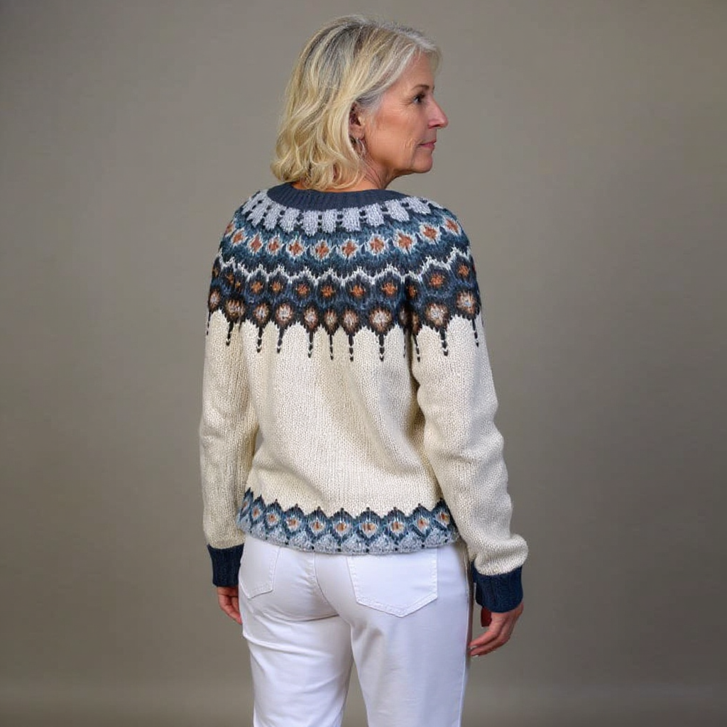Kara vintage Icelandic cardigan in cream, back view showing patterned yoke and hem