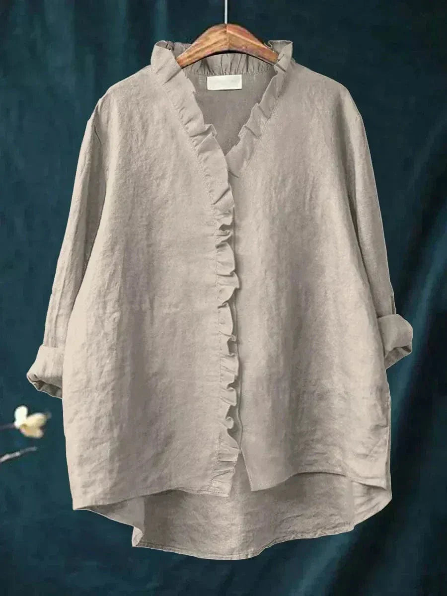 Thalia ruffled blouse in grey, front view on hanger