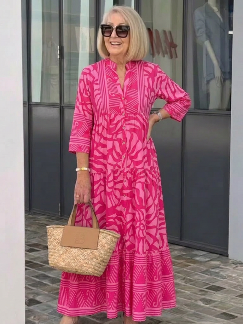 Marielle midi dress in pink styled with a straw basket bag