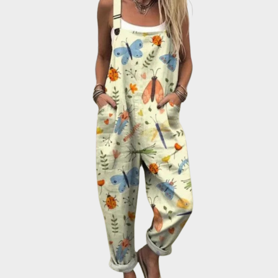 Printed dungarees in light green with painted butterfly print, full-length front view