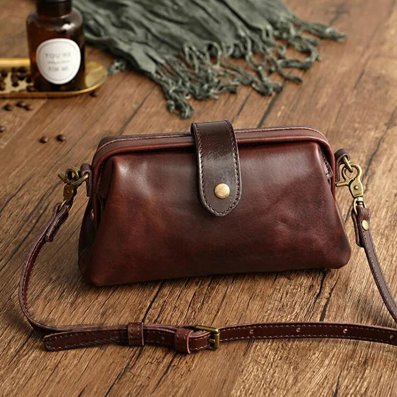 Cressida mini crossbody bag in coffee, front view with strap