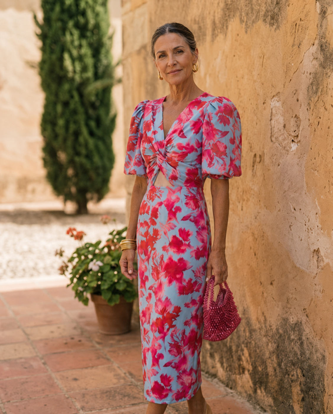 Wanda puff sleeve midi dress in light blue and red floral print, front view with twist detail