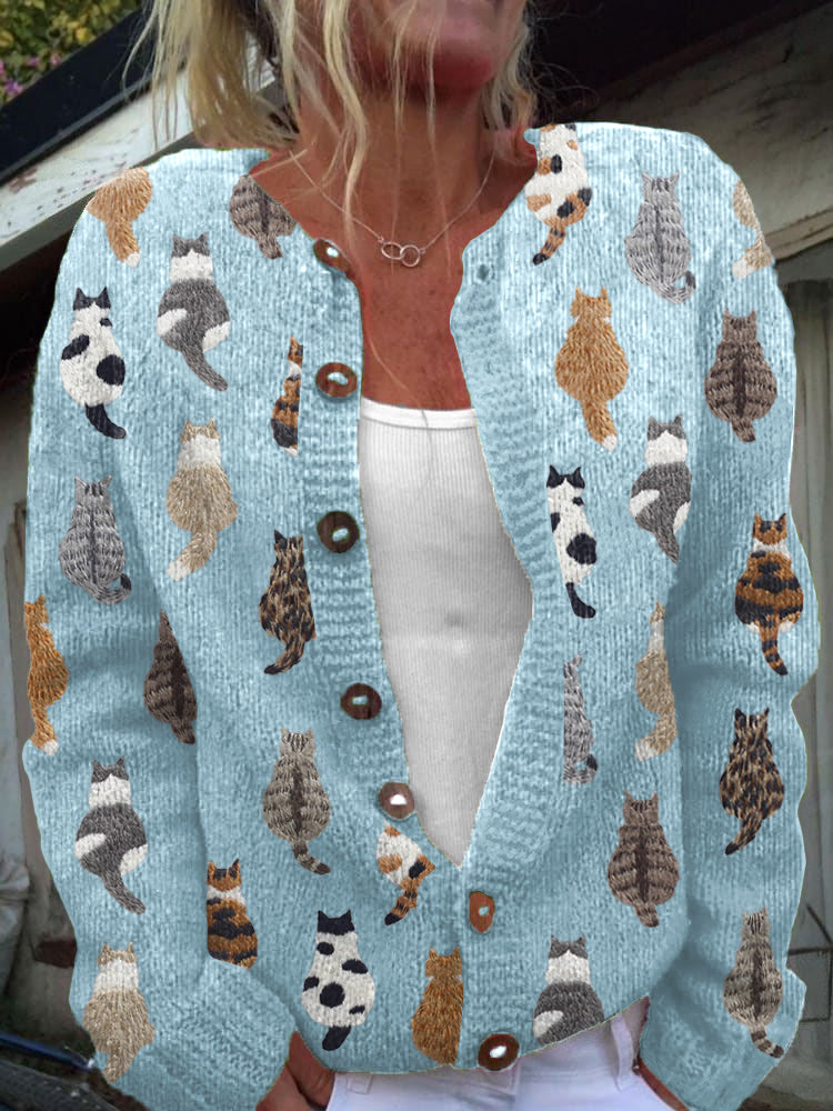 Charlotte cat print cardigan in light blue, front view on model
