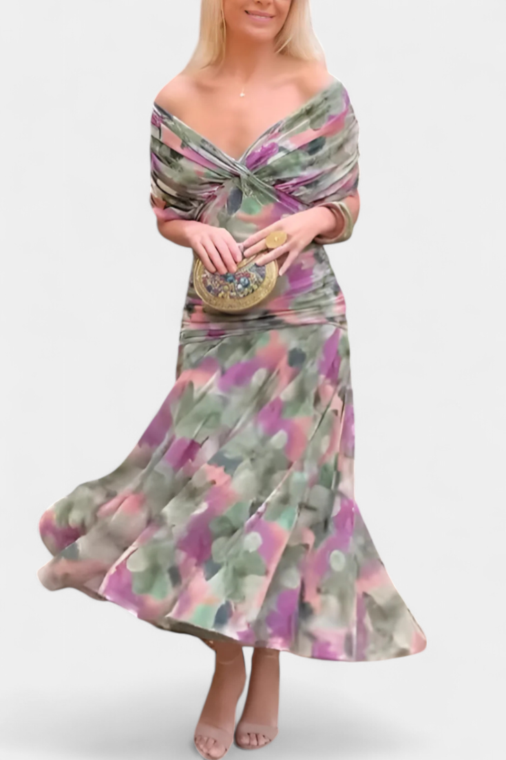 Lowenna elegant dress in green and purple print with flowing midi skirt