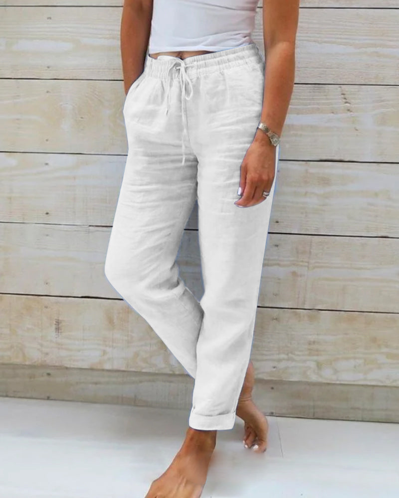 Averie relaxed drawstring trousers in white, full-length front view