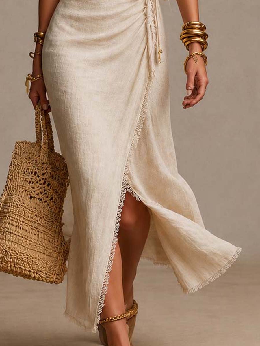 Isabella beige wrap skirt detail with scalloped lace along the side slit