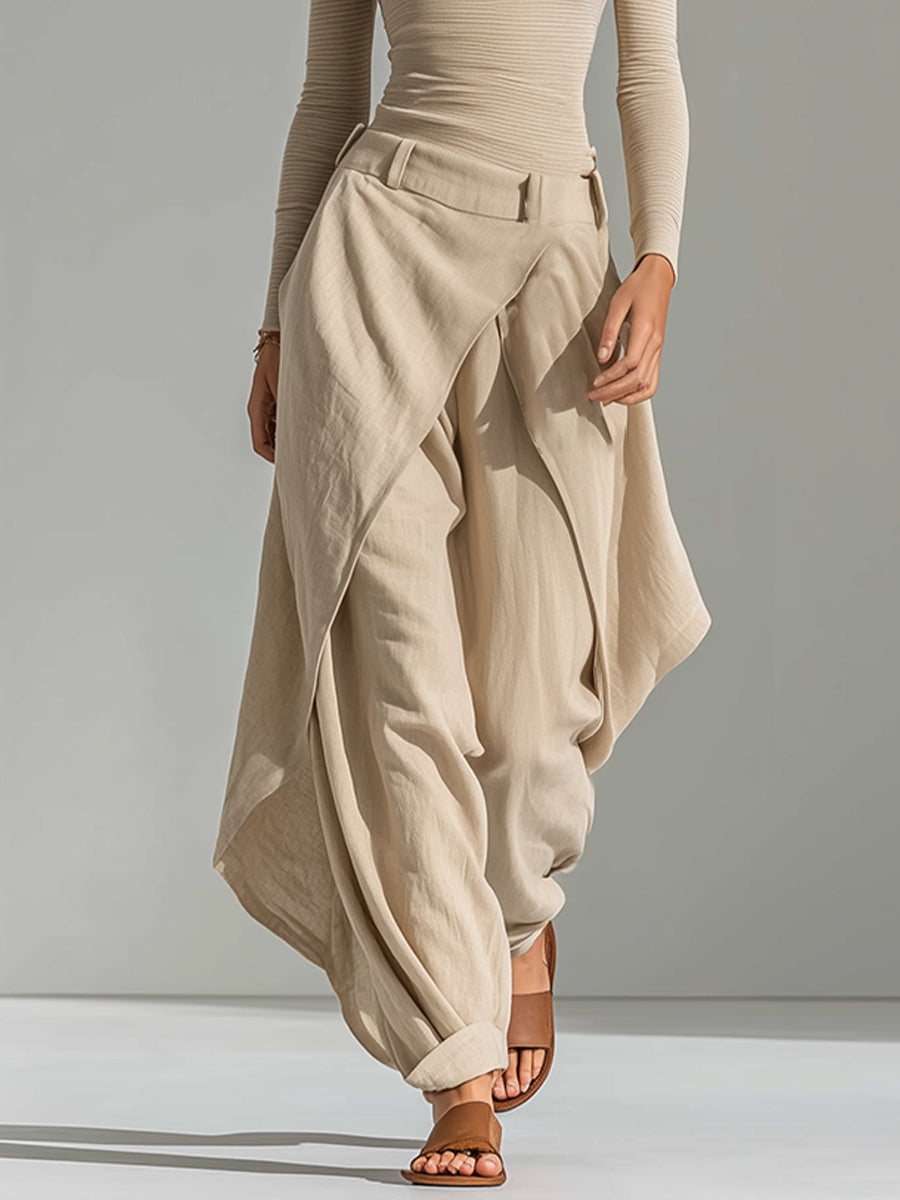 Delphine beige wide-leg ruffle trousers, close-up of draped front panel
