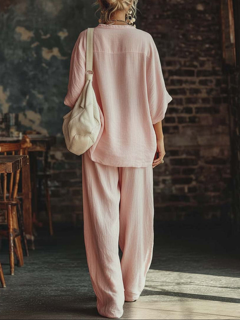 Samantha shirt and trousers set in pink, full-length back view