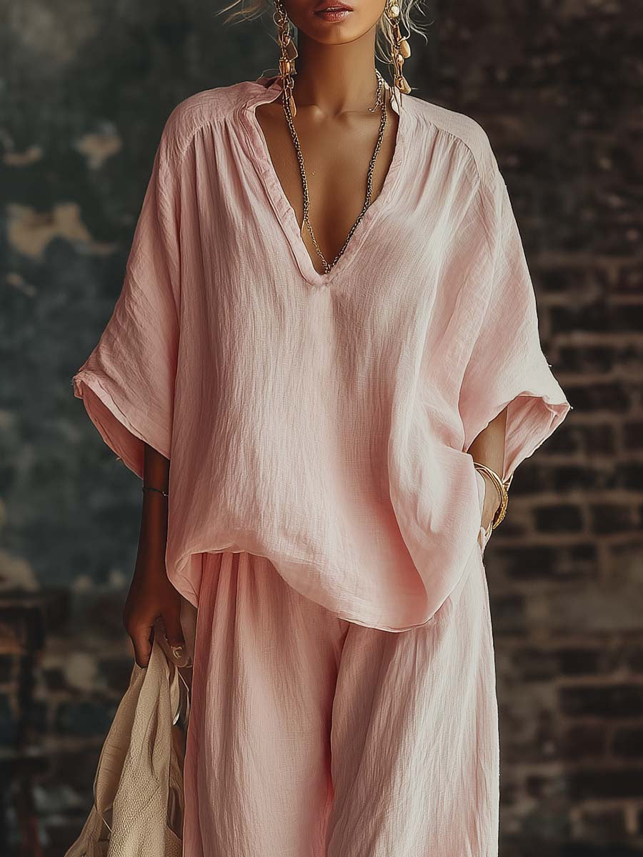 Samantha set in pink, close-up of split V-neckline and sleeves