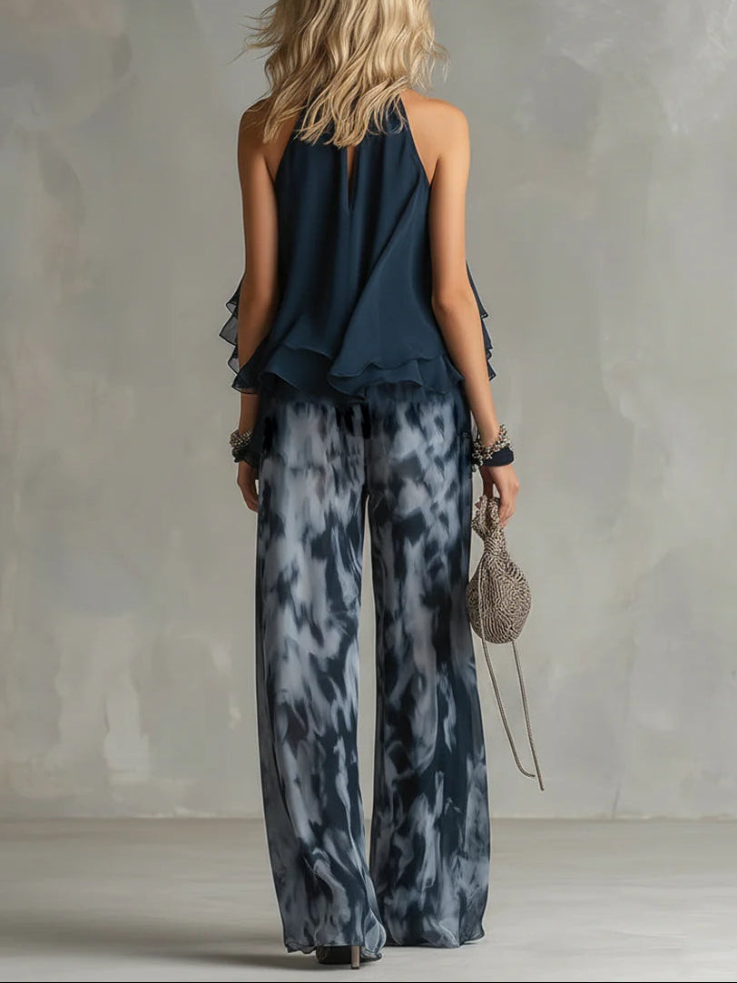 Sofia navy halter top and printed trousers, back view with keyhole detail