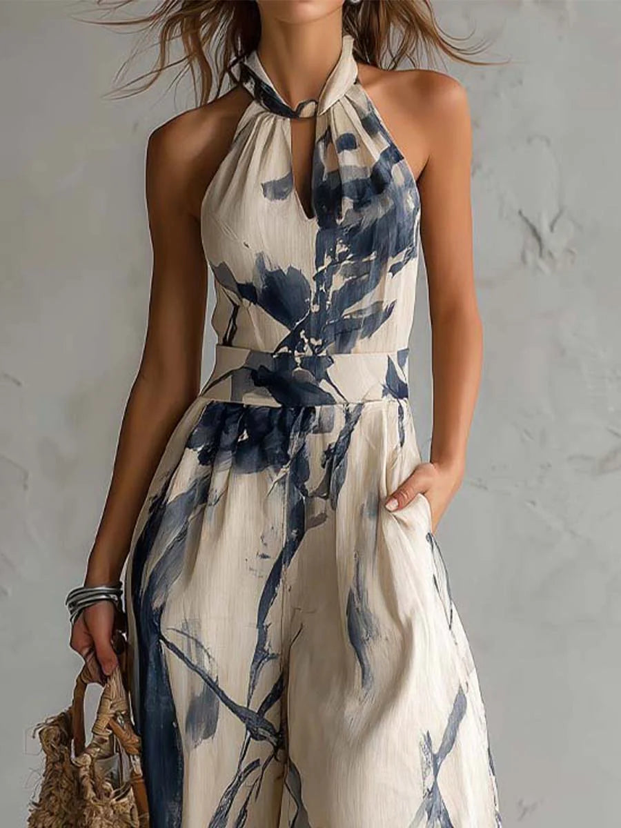 Close-up of Lila jumpsuit halter neckline and ink wash print bodice