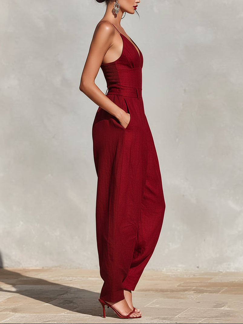 Scarlett jumpsuit in red, side view with deep pocket