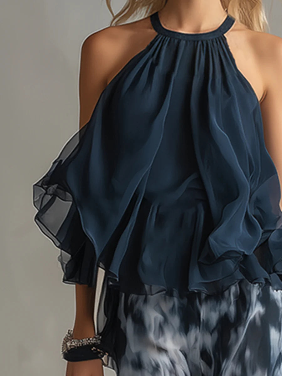 Close-up of Sofia navy halter top with layered chiffon ruffles