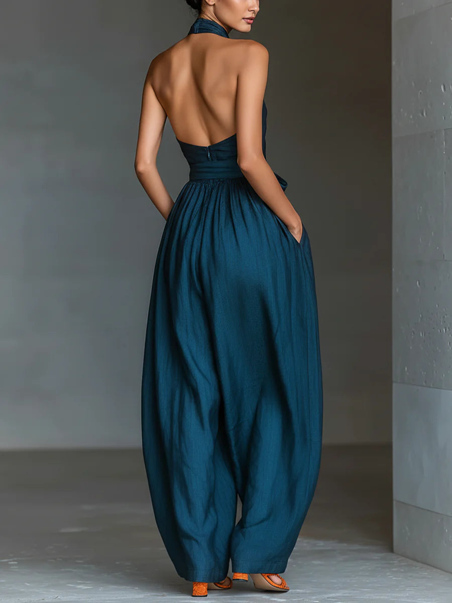Nadia halter jumpsuit in navy, open back view