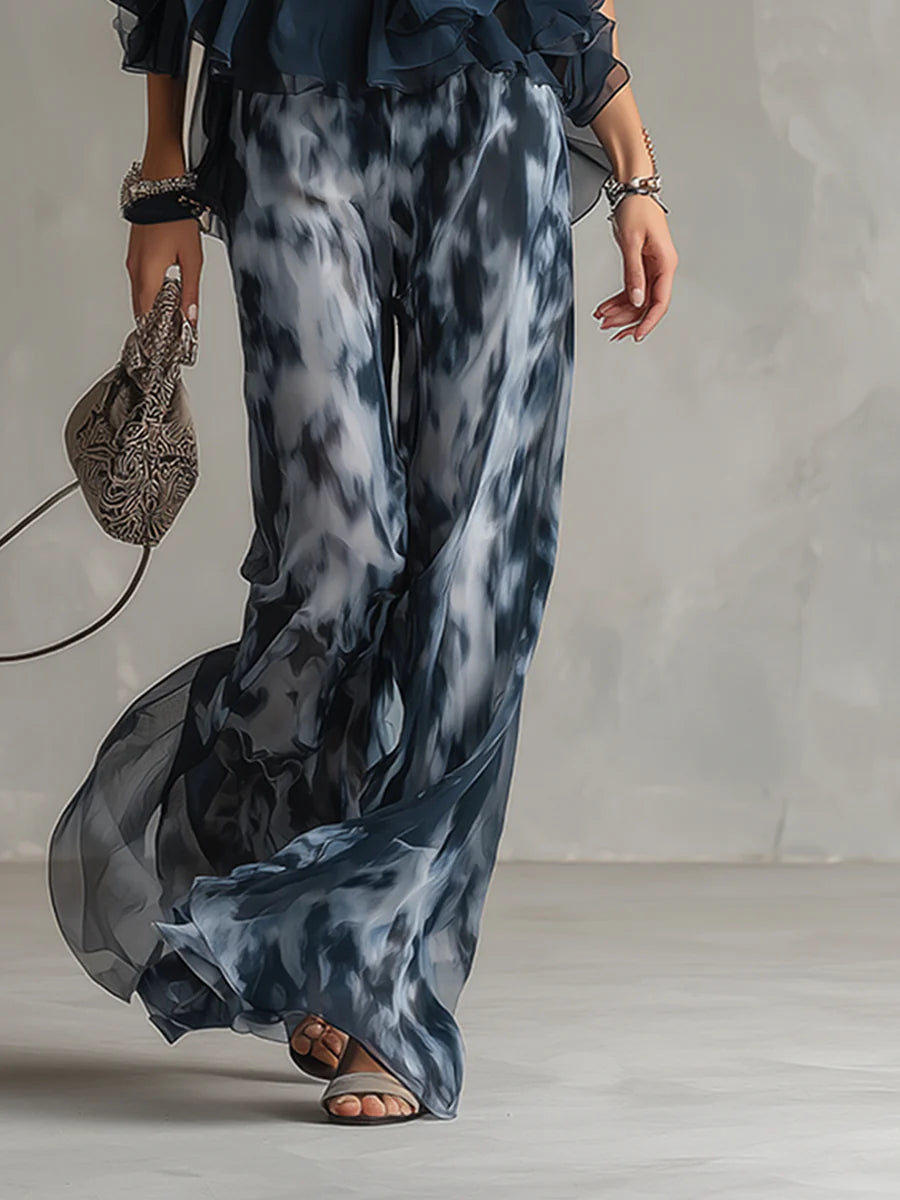 Close-up of Sofia abstract printed wide-leg chiffon trousers