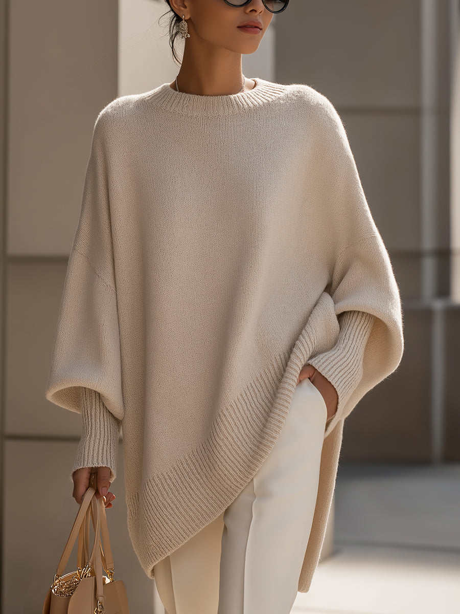 Wanwen oversized sweater in beige, front view with asymmetric hem