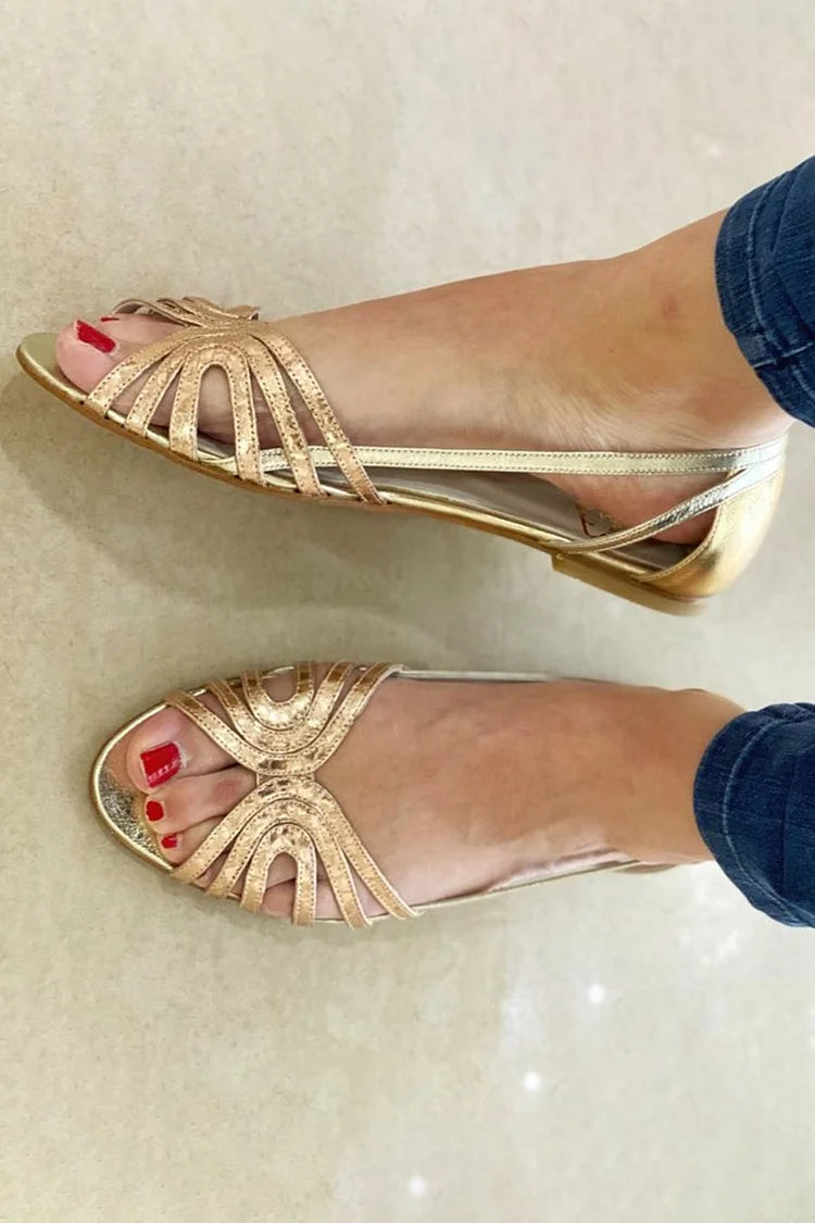 Eleonora flat sandals in gold, side and top view on feet
