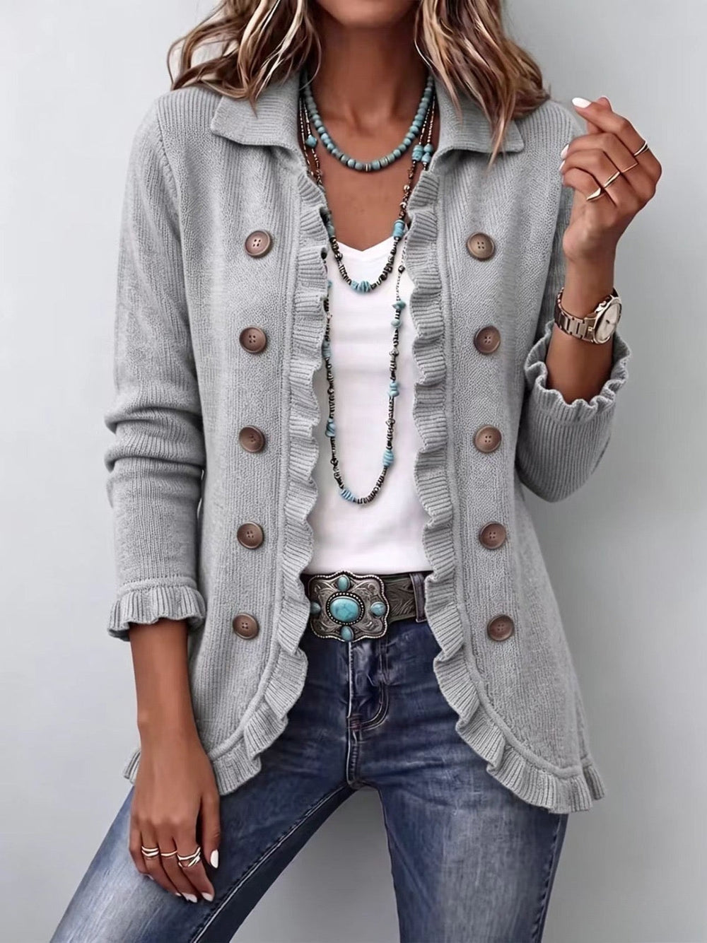Eloísa knit ruffle jacket in heather grey, worn open over jeans, front view