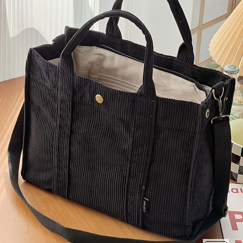 Maribel daily tote bag in black corduroy, angled front view