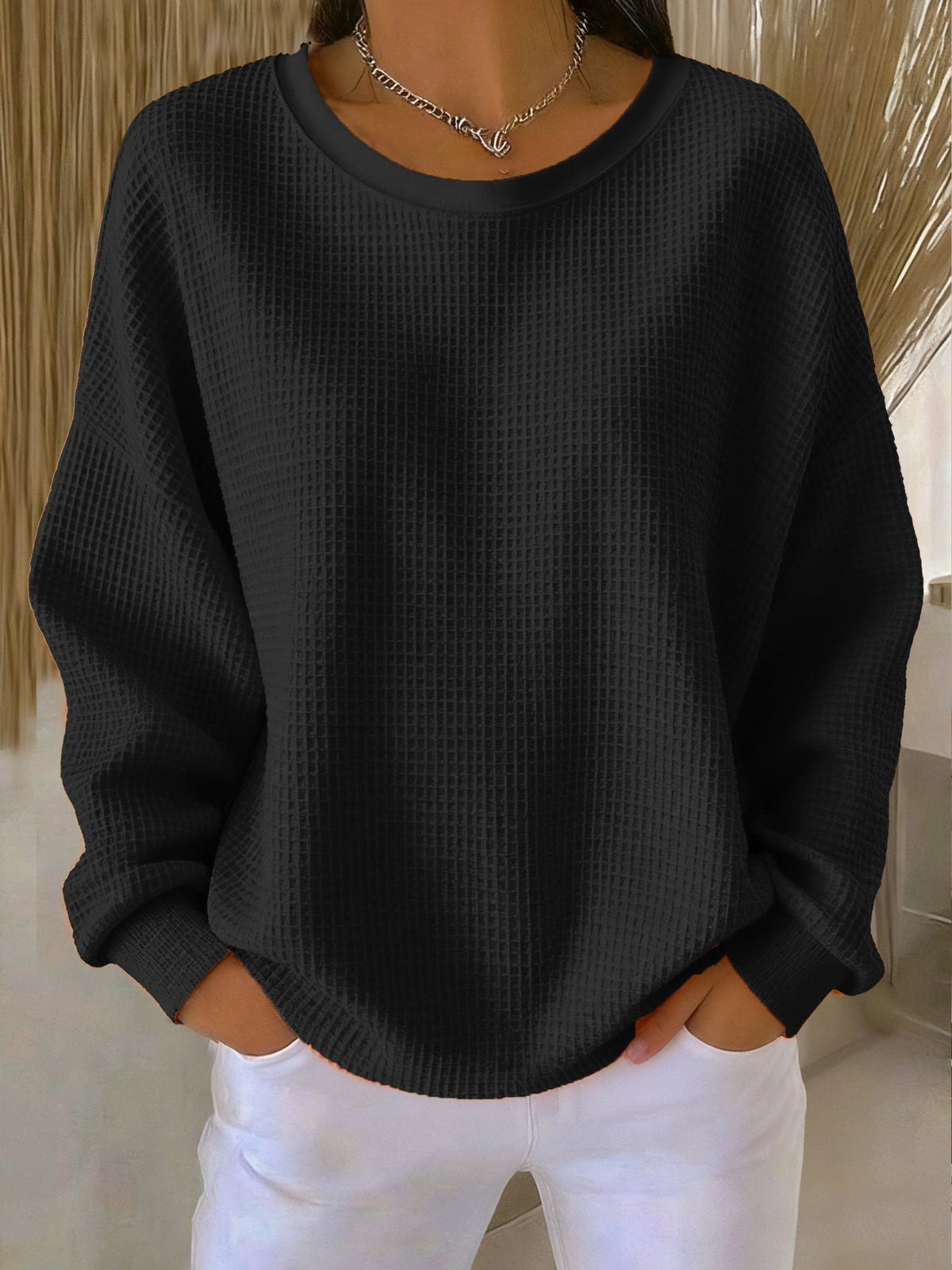 Kate waffle knit sweatshirt in black, front view