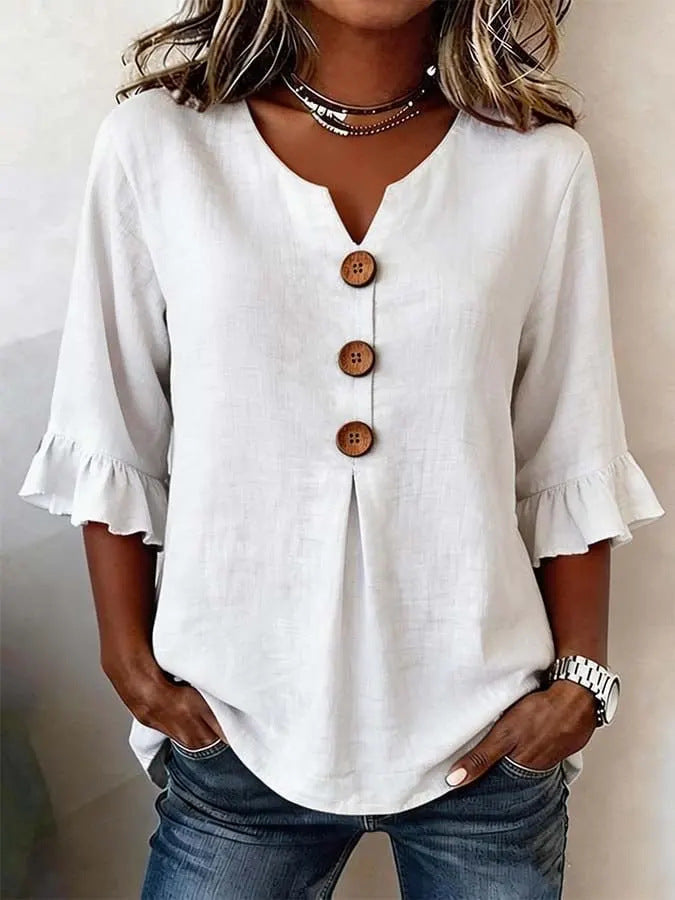 Jessara ruffle-sleeve blouse in white, front view with wooden button placket