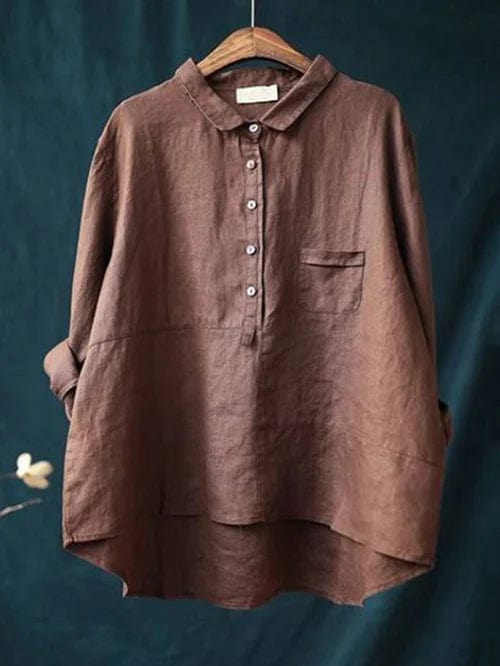 Fenora collared blouse in rust red, front view on hanger