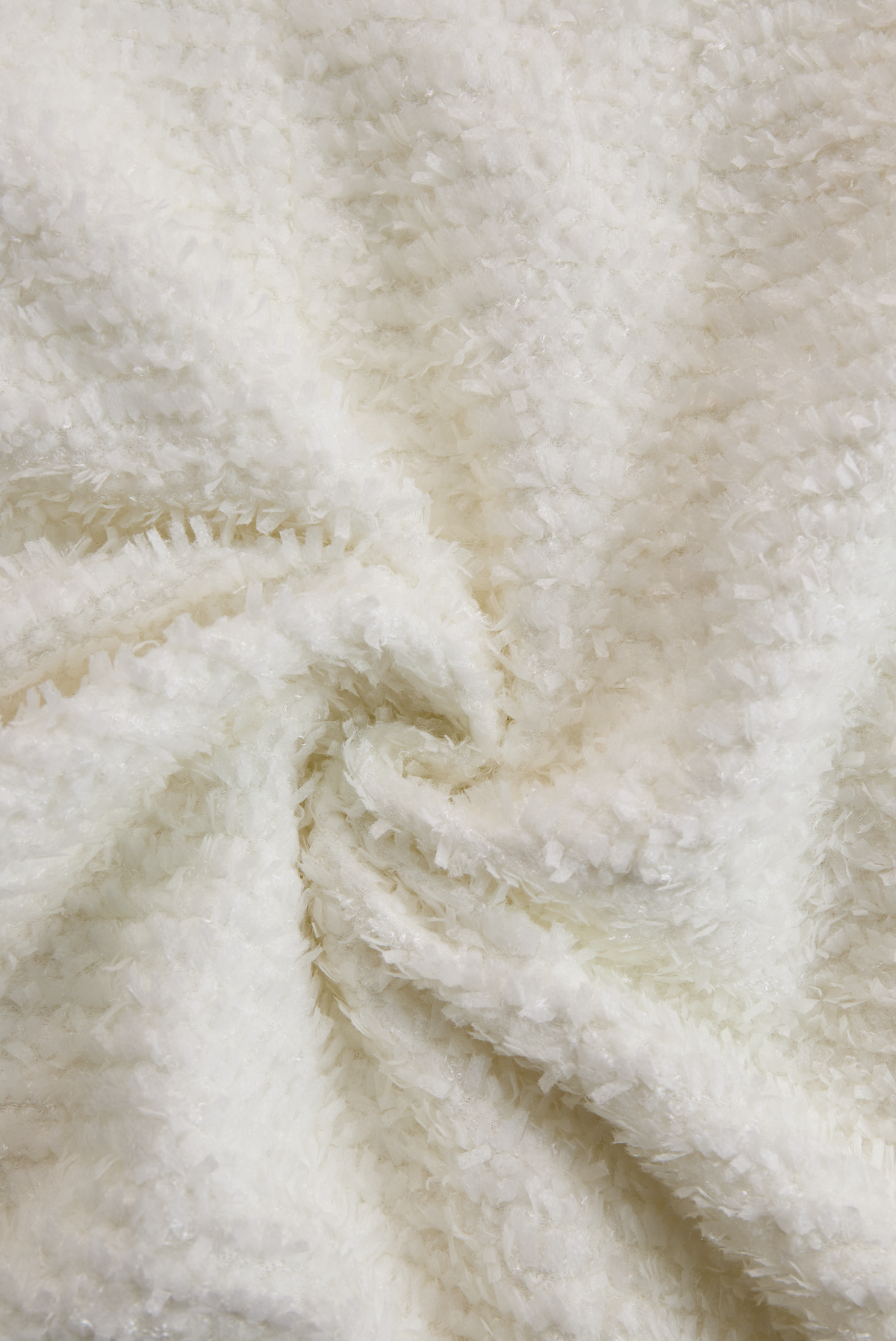 Antigone dress fabric detail, soft ivory tweed texture