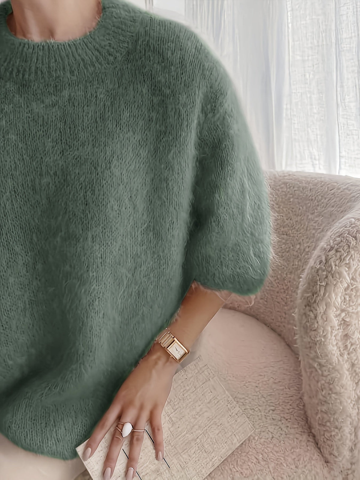 Ember crew neck sweater in army green, close-up of neckline and sleeve