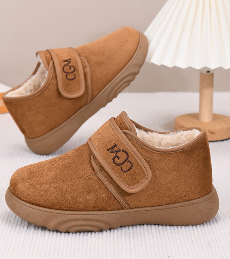 Doralise strap shoes in brown, pair styled beside a lamp