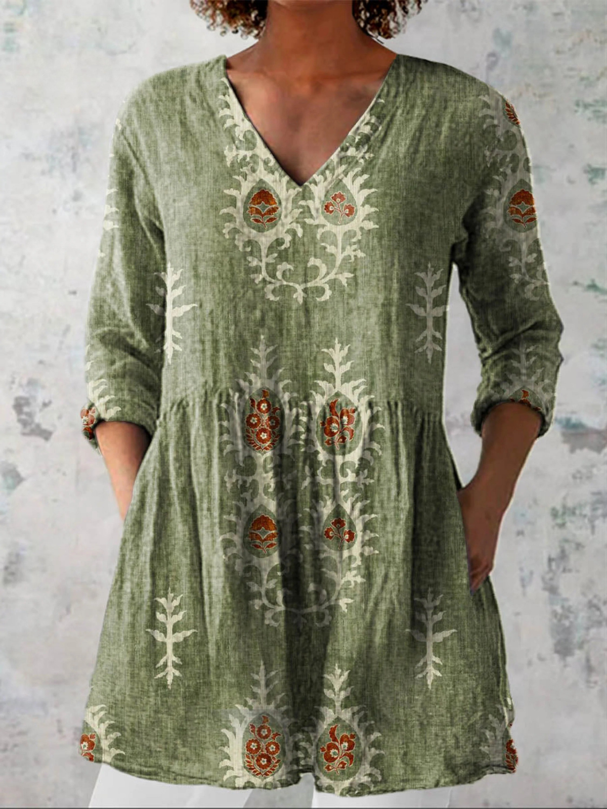 Elise long V-neck blouse in green with folk floral print, front view