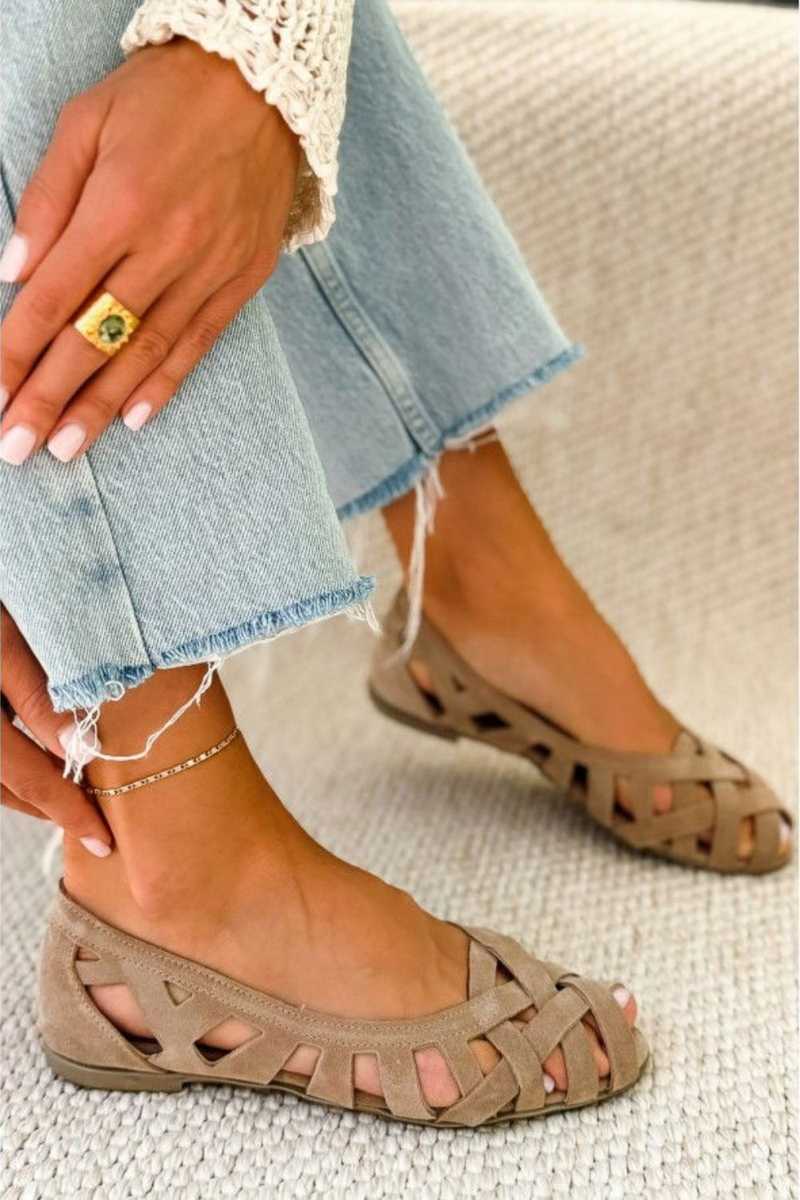 Caterina woven sandals in beige, worn with cropped jeans
