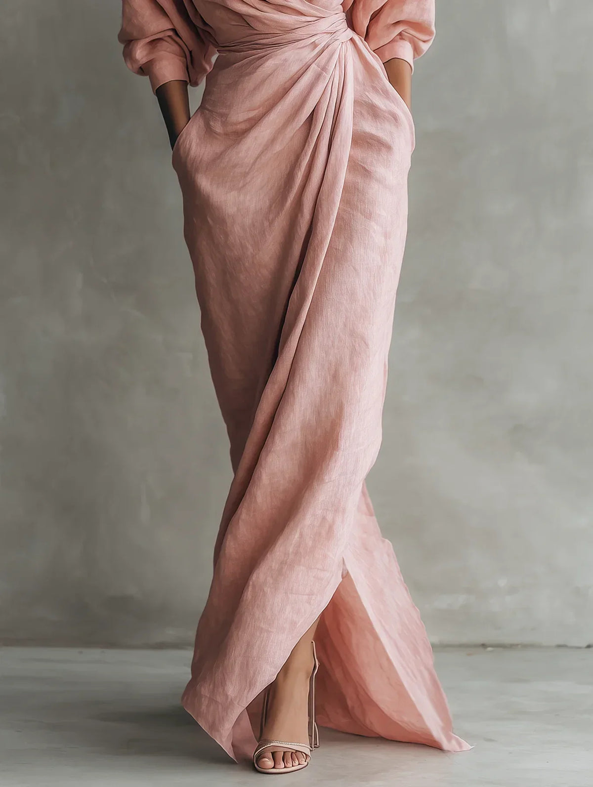 Lorena maxi dress in pink, close view of draped skirt and front slit