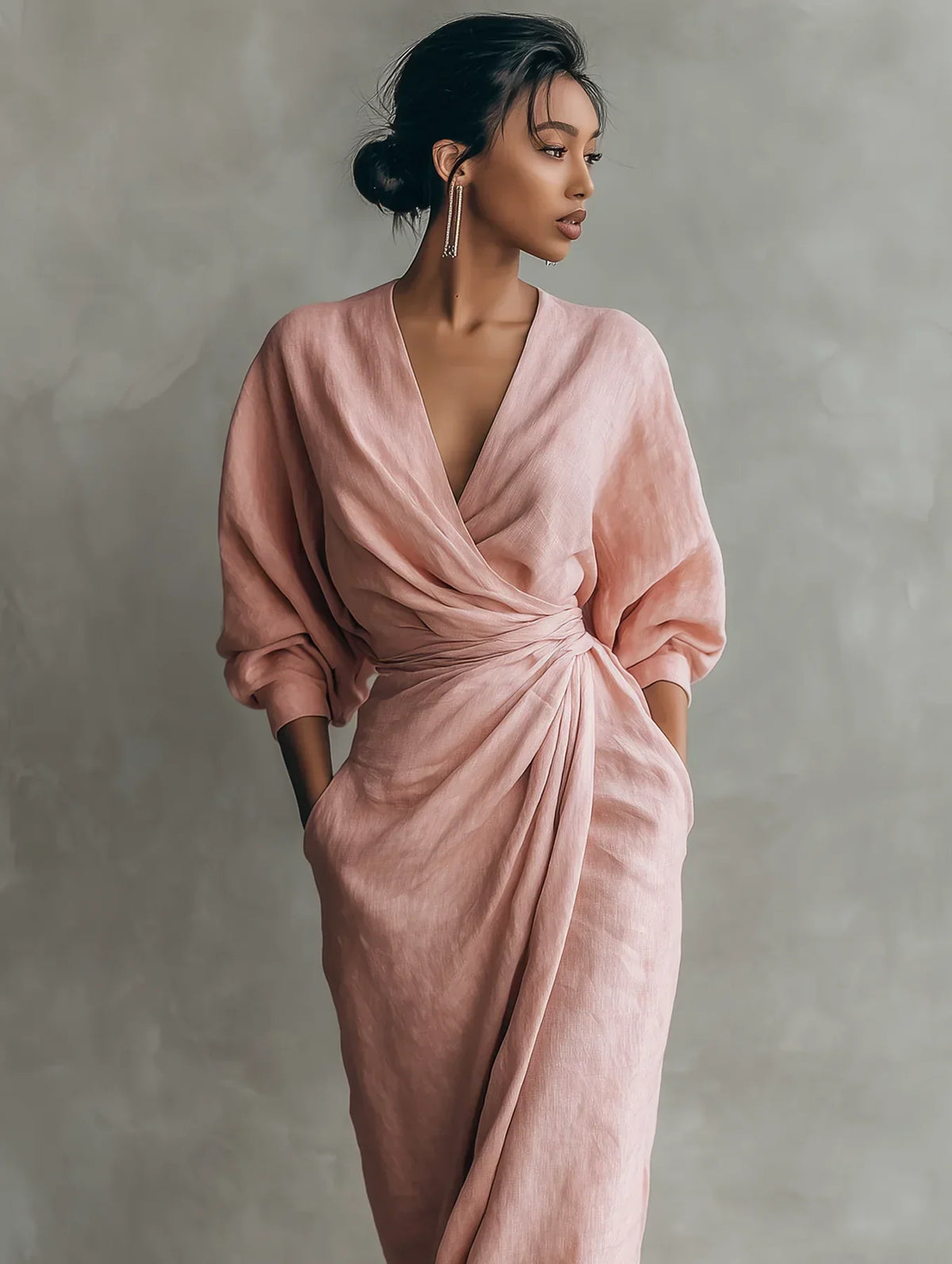Lorena maxi dress in pink, close view of V-neck and waist knot