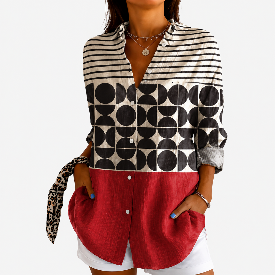 Retro colour block blouse in black, cream and red, front view worn with white shorts