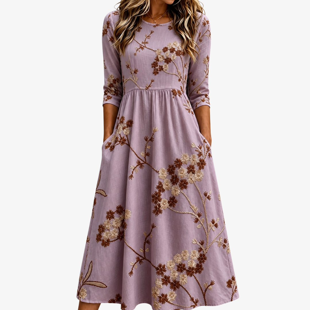 Heather Meadow floral midi dress in lavender, full-length front view with side pockets