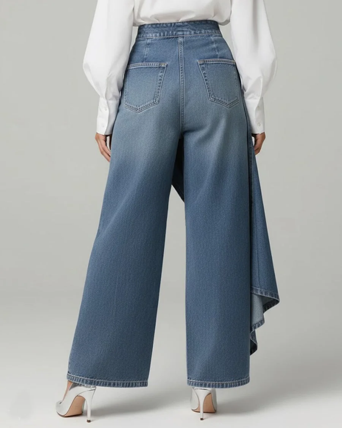 Audrey denim wrap trousers in light blue, back view with patch pockets
